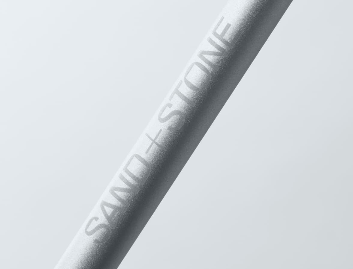 A close up image of customisation on a aluminium MOO twist pen.