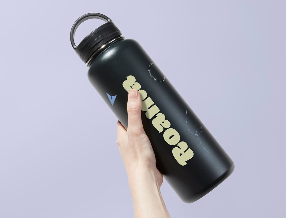 Hand holding the Large Insulated Water Bottle in Jet Black with 360 wrap printing customisation