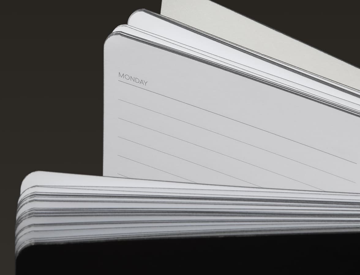 Detail image of the top corner of a softcover planner.