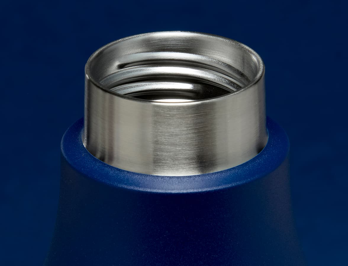 Detail image of a midnight blue water bottle mouth.