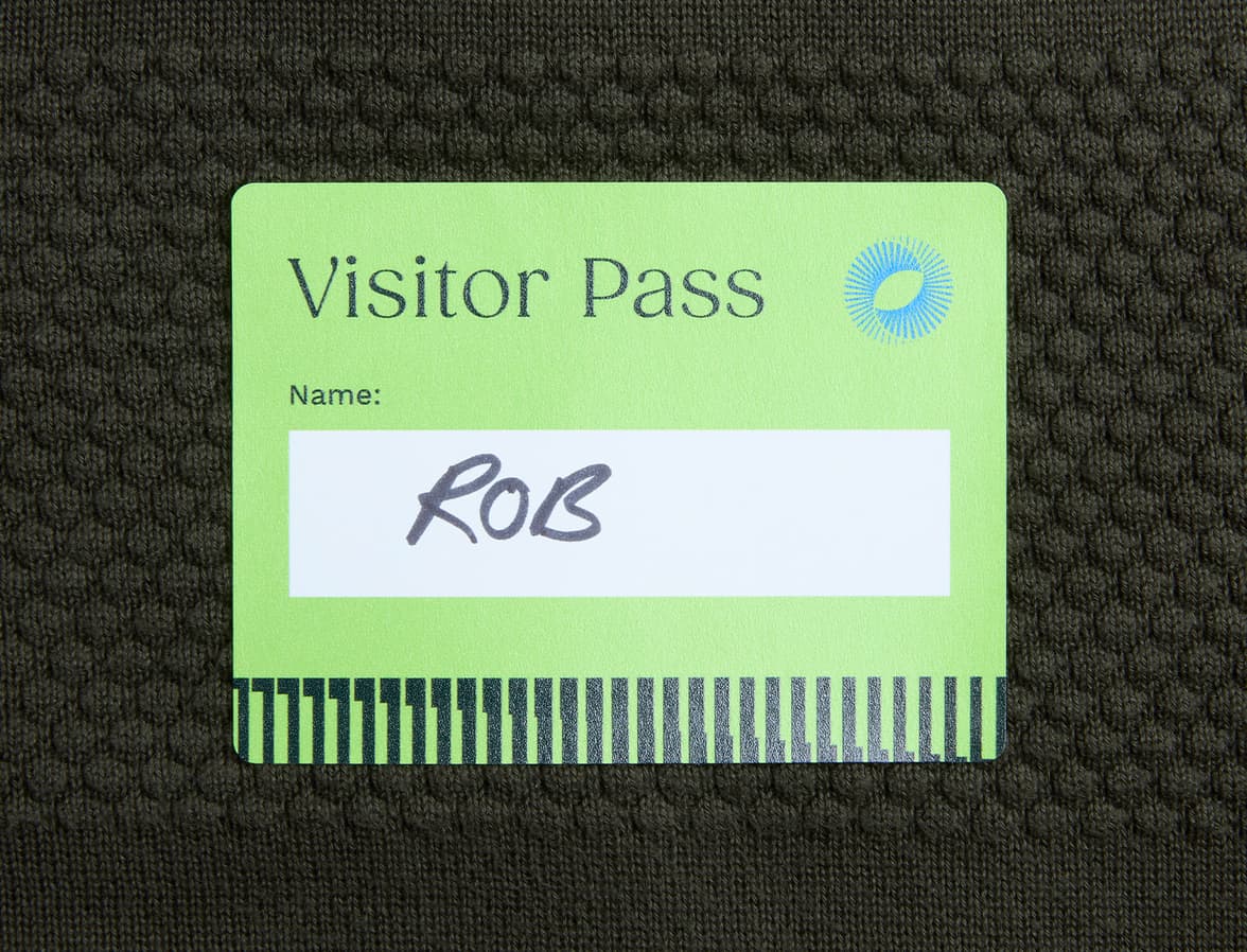 A name tag style matte paper sticker in green.