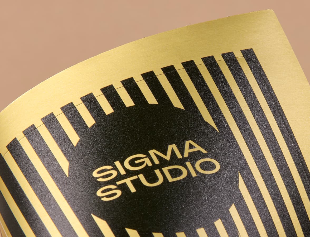 A detailed image of a customized gold metallic sticker.