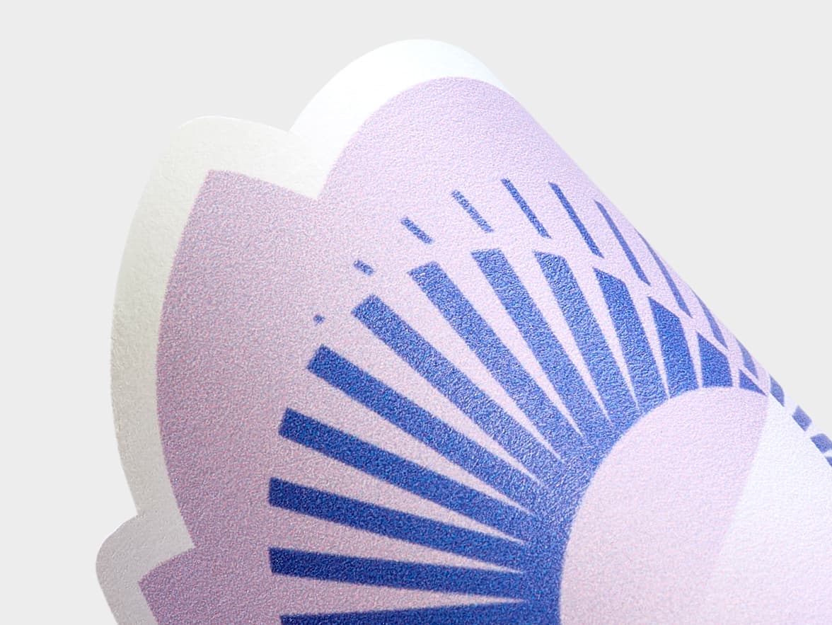 A close up image of a customized spiral matte paper sticker.