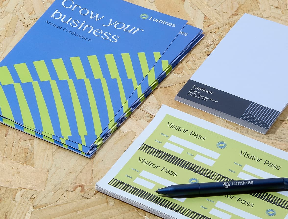 A collection of customized print products including rectangular name tags.