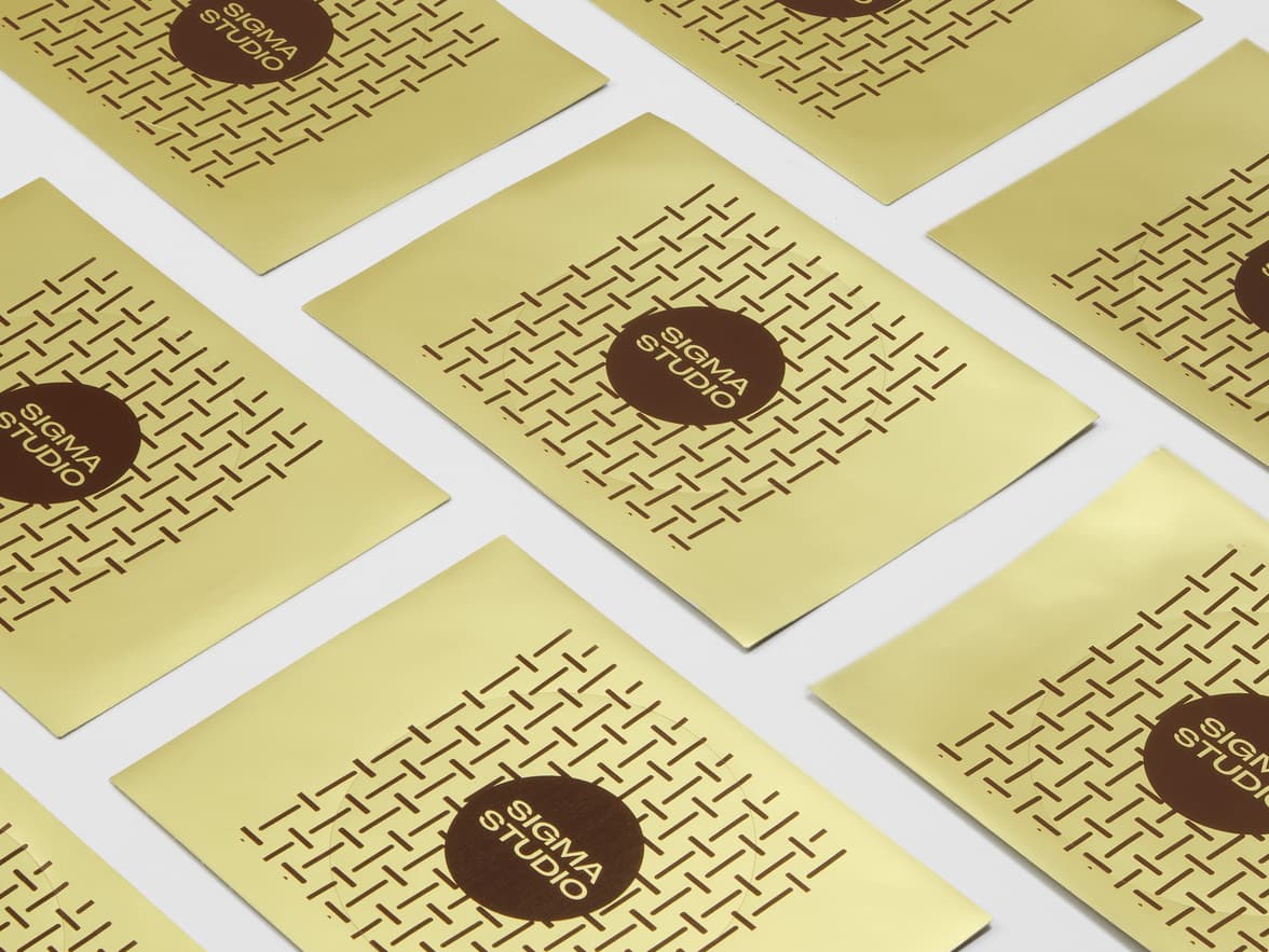 A collection of round gold metallic Aluminium stickers with brown customization