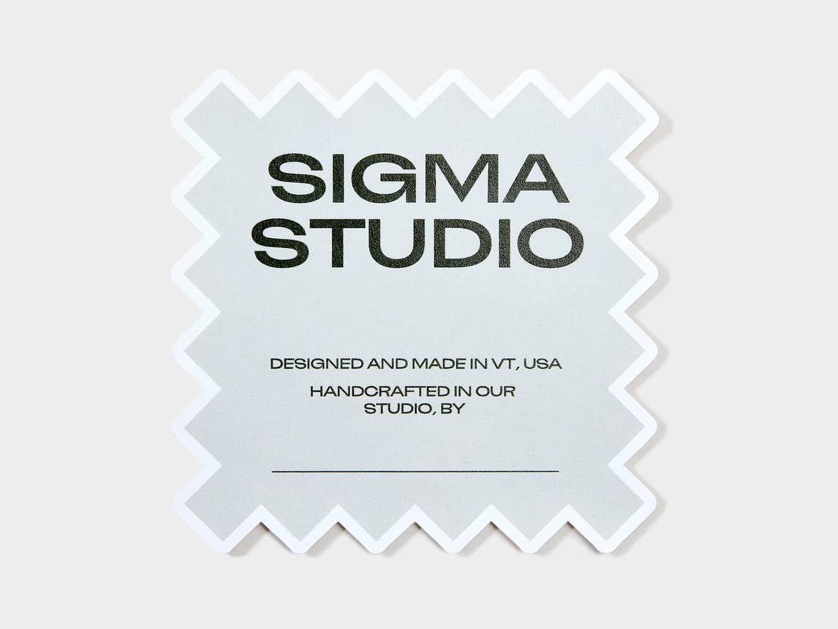 A customized matte paper sticker in the shape of a square with jagged edges.