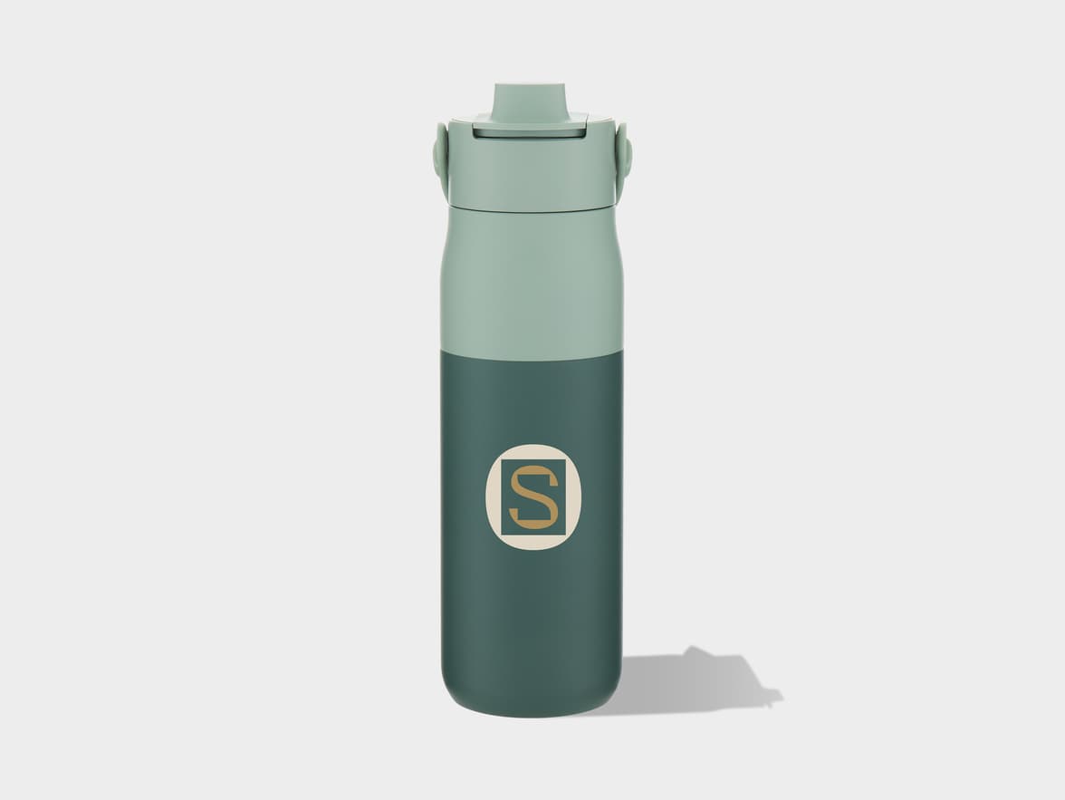 A two-toned green bottle with a lighter top and a darker bottom, featuring a lid with a flip-up spout and a circular "S" logo on the lower part.