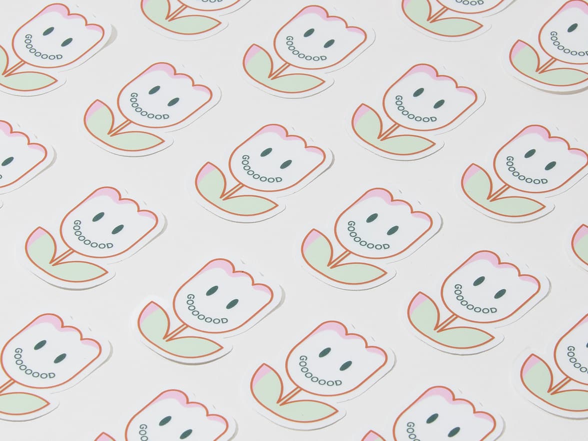 A collection of customized clear die cut stickers in the design and shape of a flower.