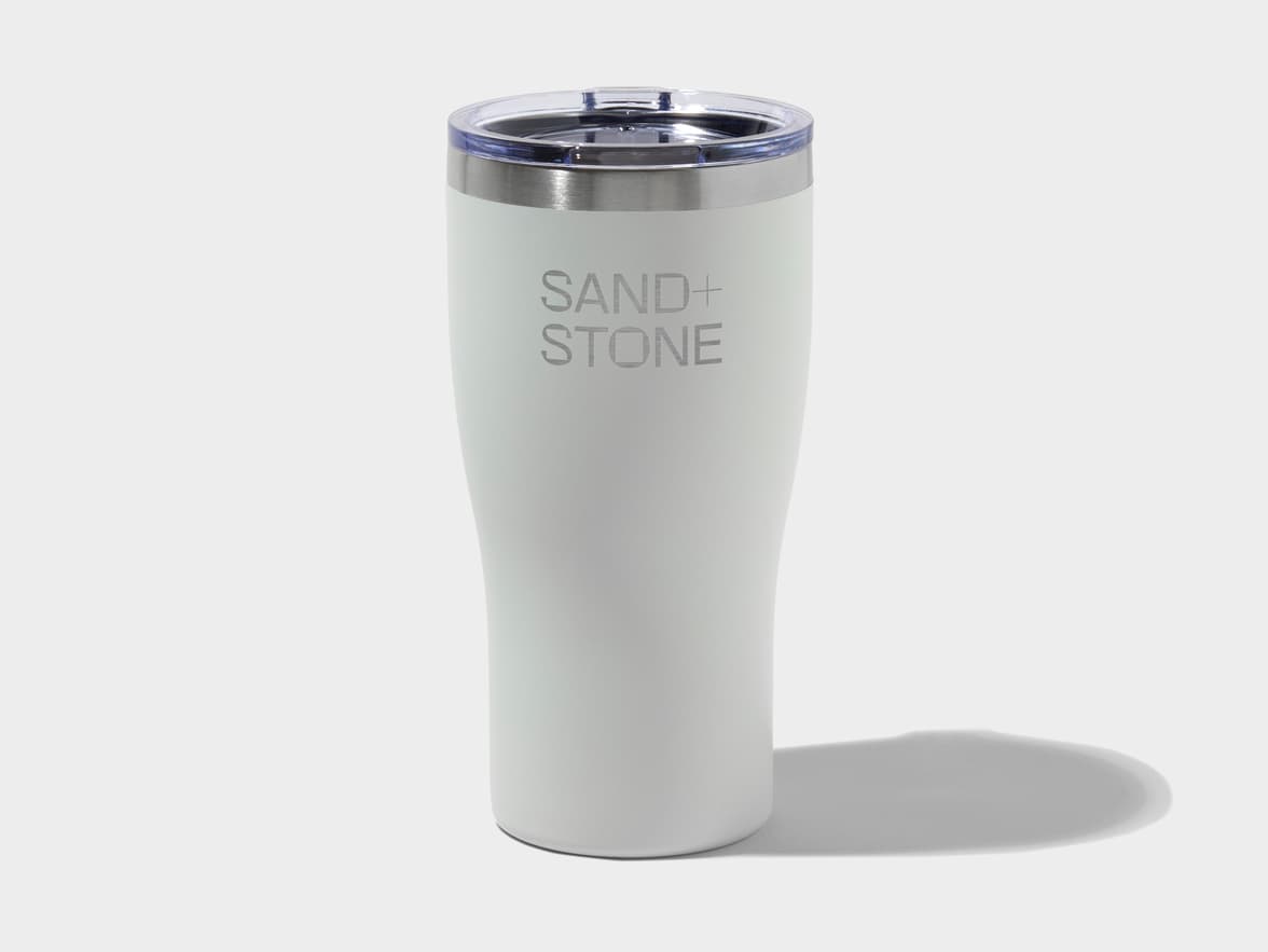 Insulated tumbler in cloudy grey with custom engraving.