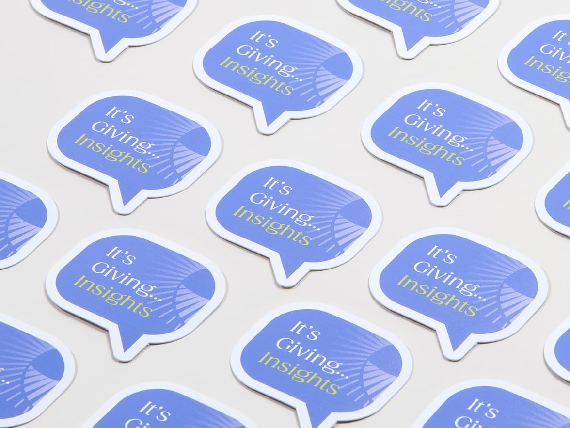 A collection of customized coated stickers in the shape of a speech bubble.